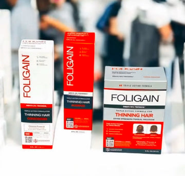 橙白色包装盒中的FOLIGAIN男士TRIOXIDIL洗发水、护发素和外用护理产品。